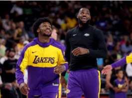 In a preseason game, LeBron James and his son Bronny play together for the first time.