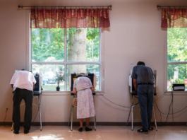 Virginia is being sued by the Justice Department for attempting to lower voter turnout around election day.